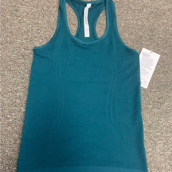 lululemon athletica Tops - Lululemon Swiftly Speed Racerback
NWT
Size 4
Emerald